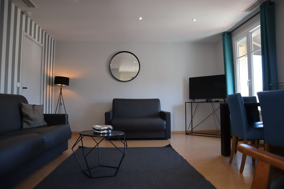 Superior Apartment | Living area | TV, iPod dock