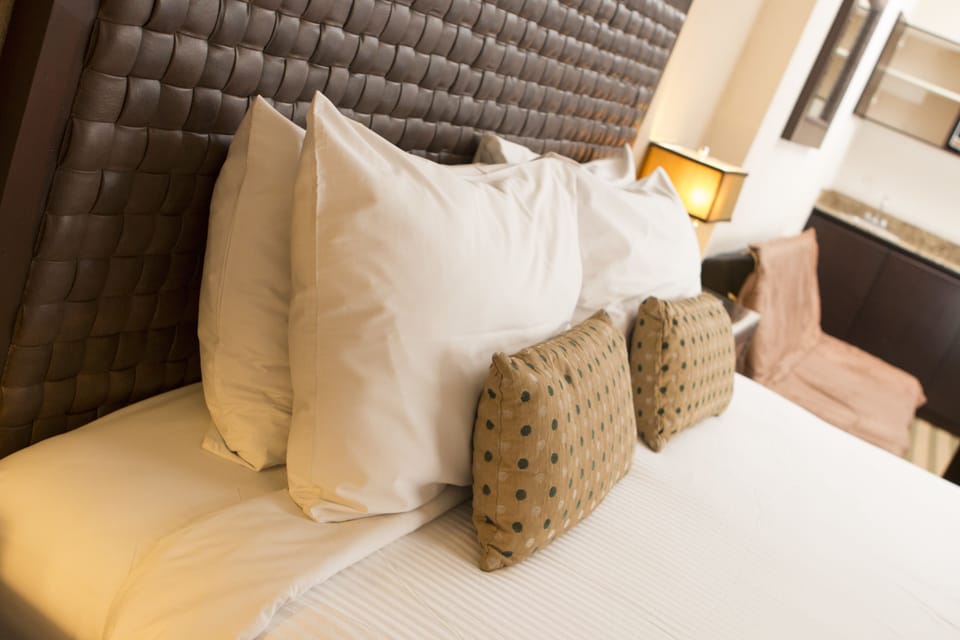 Hypo-allergenic bedding, down comforters, in-room safe, desk
