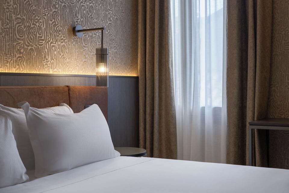 Family Triple Room | Hypo-allergenic bedding available, memory foam beds, minibar