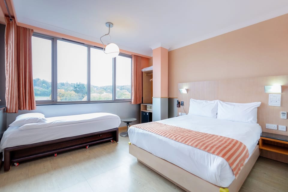 Memory foam beds, minibar, in-room safe, desk