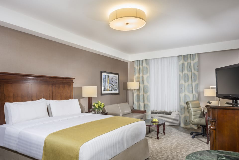 Premium bedding, down comforters, pillowtop beds, in-room safe