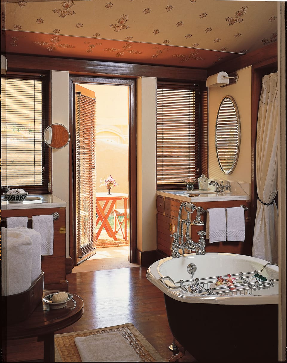 Separate tub and shower, deep soaking tub, designer toiletries