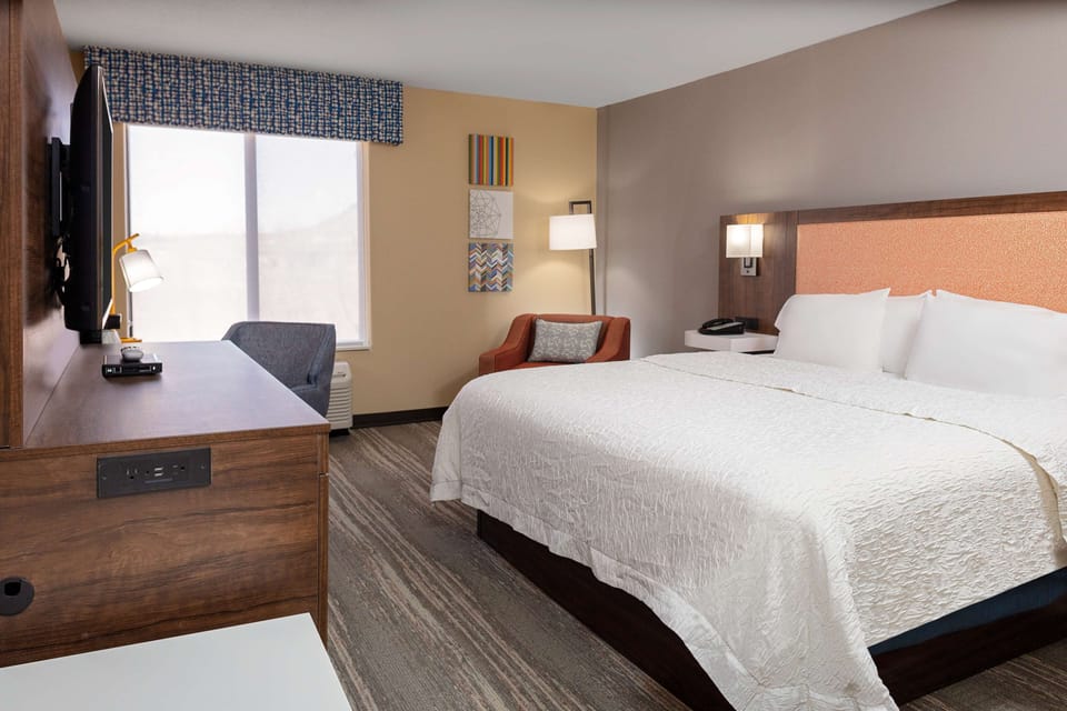 Desk, blackout drapes, iron/ironing board, free cribs/infant beds