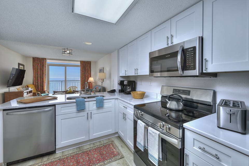 Condo, 2 Bedrooms, Oceanfront (1201) | Private kitchen | Fridge, microwave, oven, stovetop