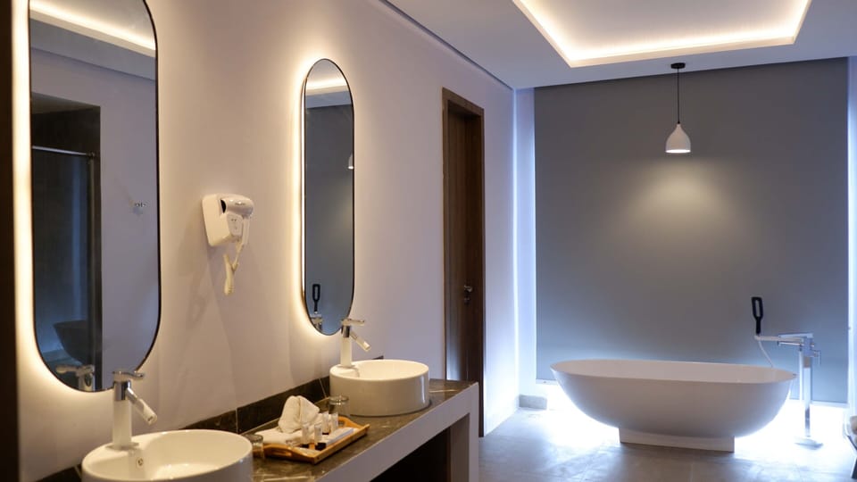 Presidential Room, Private Pool, Oceanfront | Bathroom | Separate tub and shower, hair dryer, towels