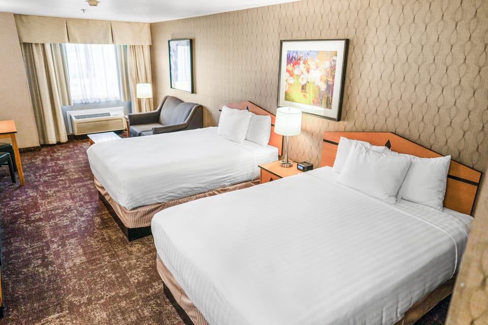 Standard Room, 2 Queen Beds, Non Smoking | Pillowtop beds, individually furnished, desk, laptop workspace