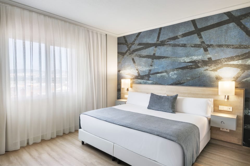 Premium bedding, down comforters, memory foam beds, minibar