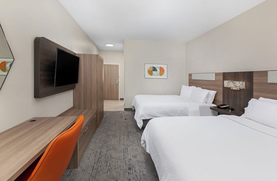 Hypo-allergenic bedding available, in-room safe, desk, laptop workspace