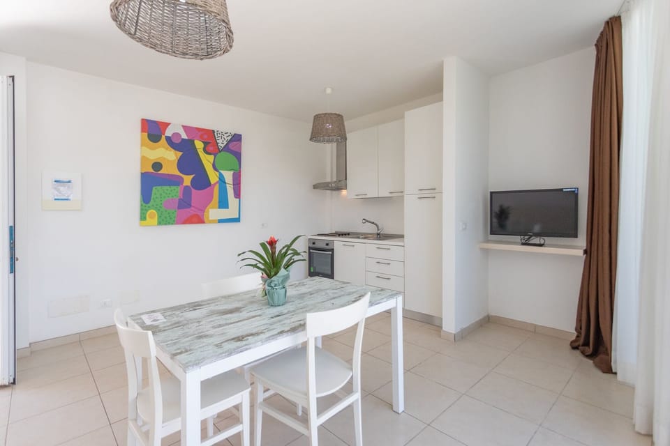 Standard Condo, 2 Bedrooms | Private kitchen | Fridge, cookware/dishes/utensils