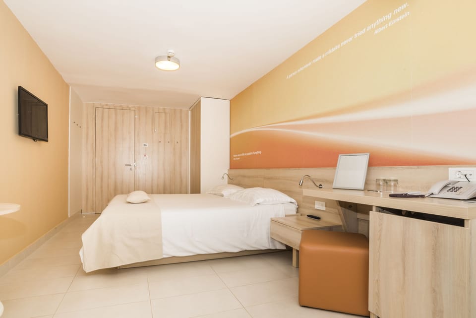 Classic Single Room, Balcony (Park side) | In-room safe, desk, blackout drapes, travel crib