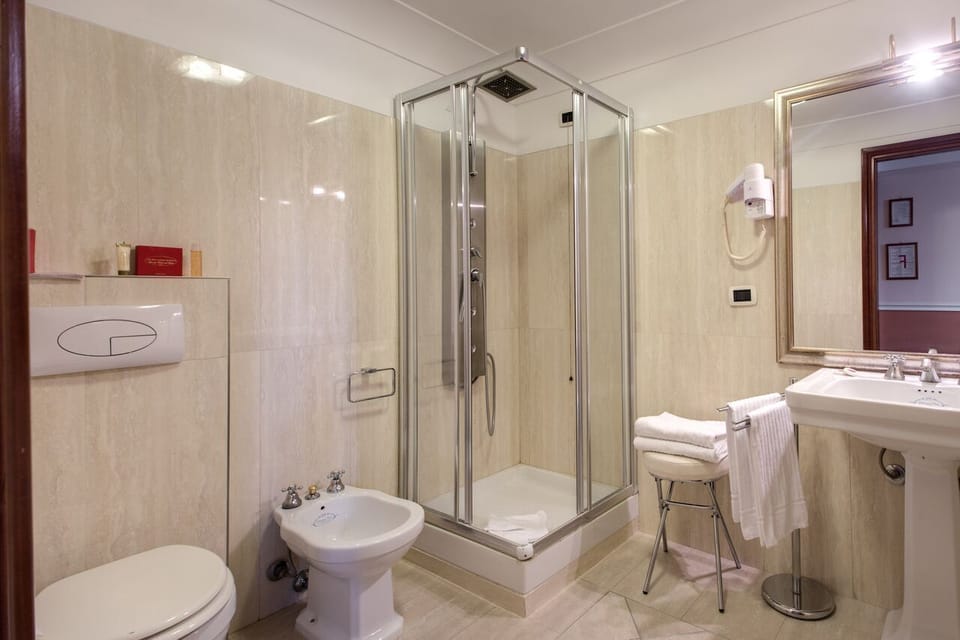 Shower, free toiletries, hair dryer, bidet