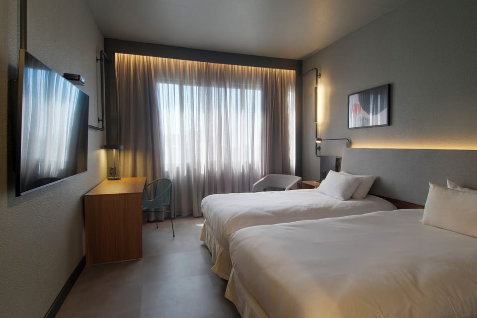 Superior Room, 2 Twin Beds | Minibar, in-room safe, desk, laptop workspace