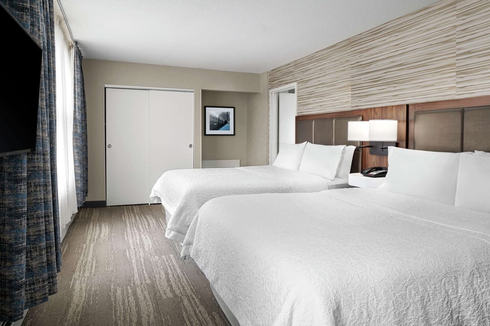 Hypo-allergenic bedding, in-room safe, laptop workspace, blackout drapes