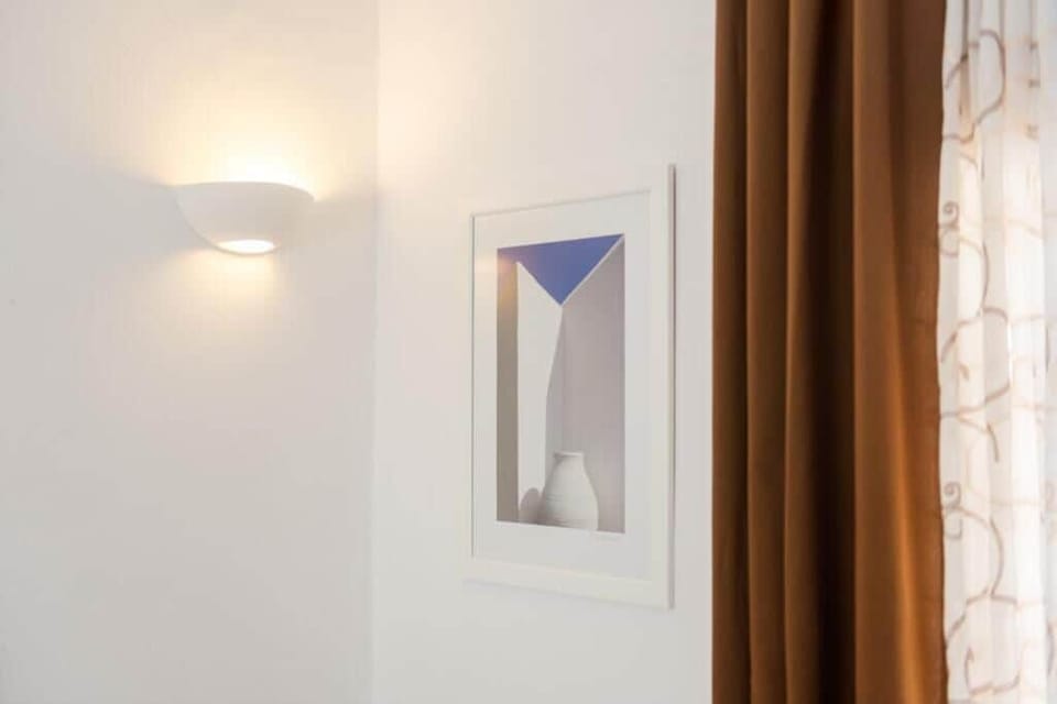Double Room, Partial Sea View | Iron/ironing board, free WiFi, bed sheets