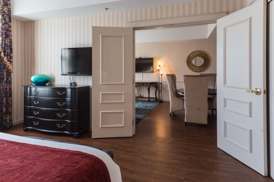 Executive Suite, 1 King Bed (Presidential Suite) | Iron/ironing board, free WiFi, bed sheets, alarm clocks