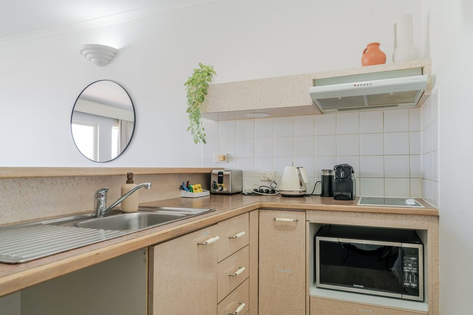 City Apartment | Private kitchenette | Full-size fridge, microwave, stovetop, espresso maker