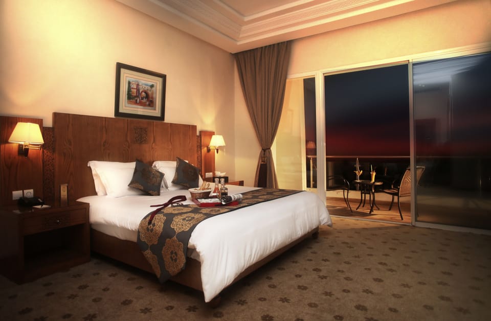 Junior Suite, Sea View | Premium bedding, minibar, in-room safe, desk
