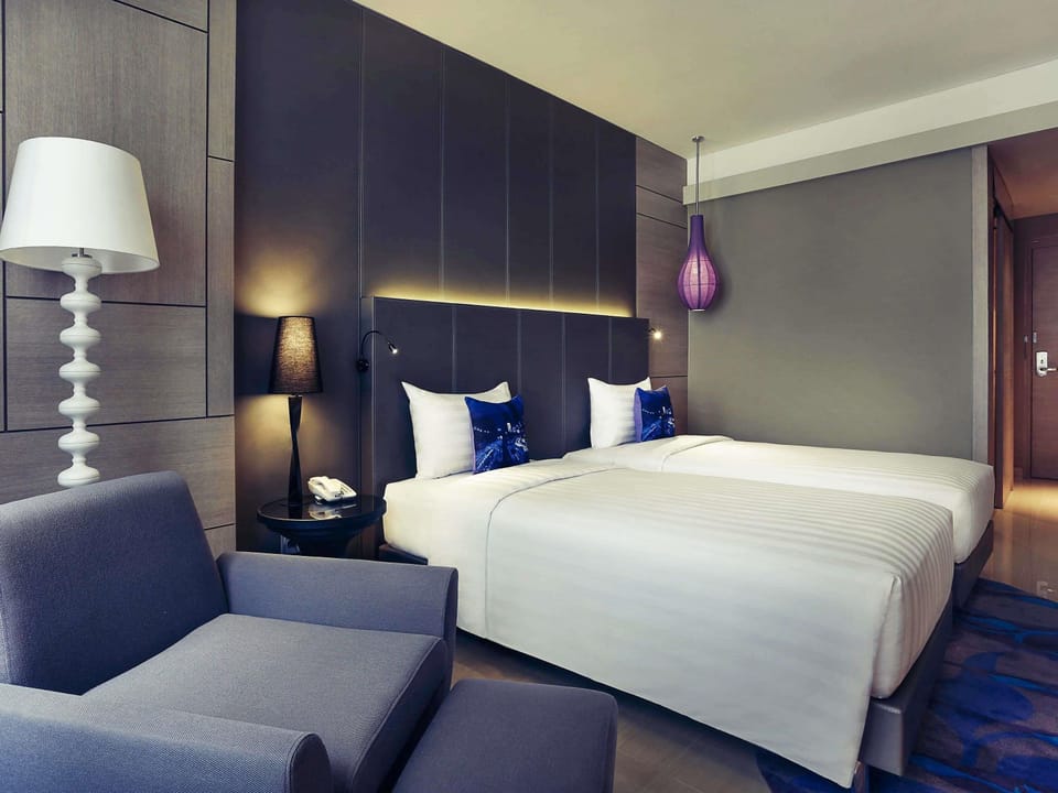 Deluxe Twin Room, 2 Twin Beds | In-room safe, desk, iron/ironing board, free cribs/infant beds
