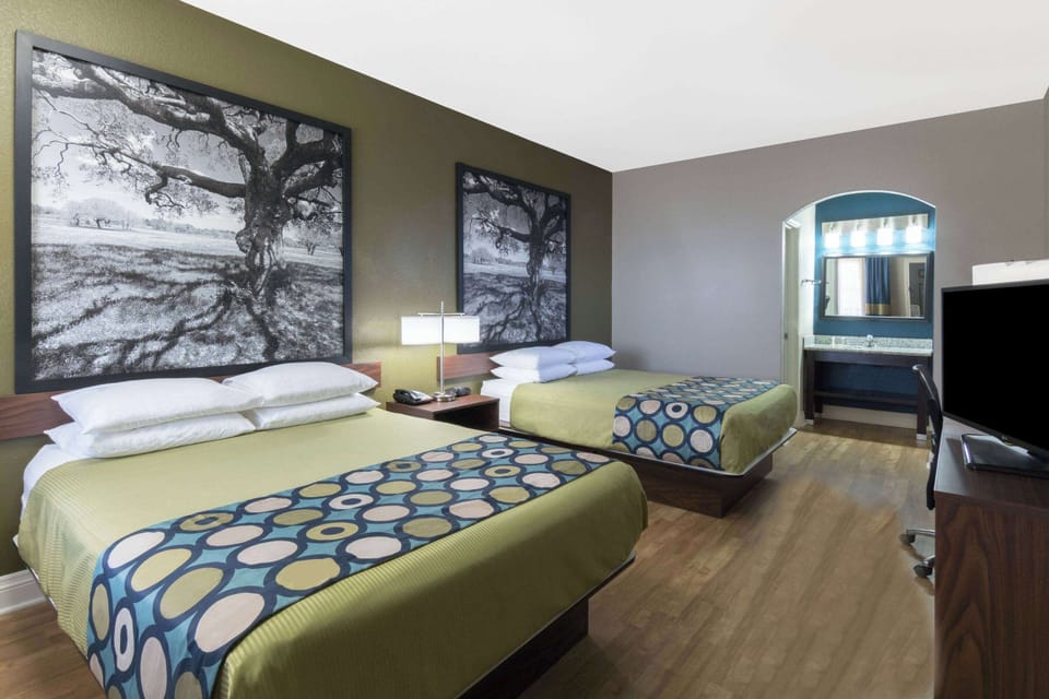 Room, 2 Queen Beds, Non Smoking | Desk, free cribs/infant beds, rollaway beds, free WiFi