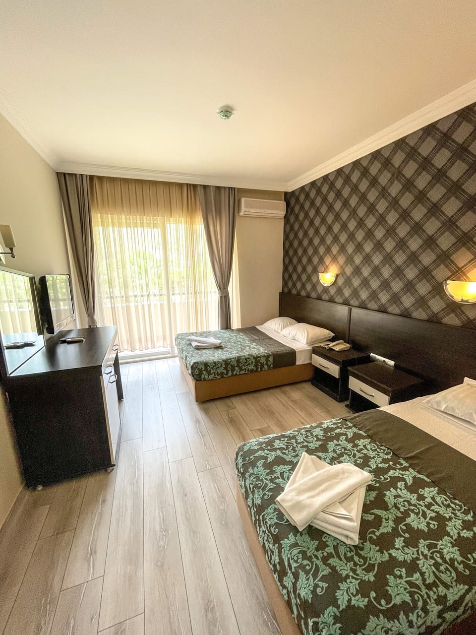 Minibar, laptop workspace, bed sheets