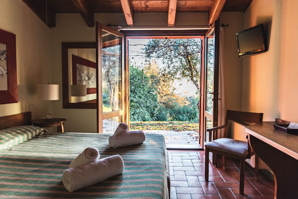 Deluxe Room, 1 Bedroom, City View | Desk, free WiFi, bed sheets, wheelchair access