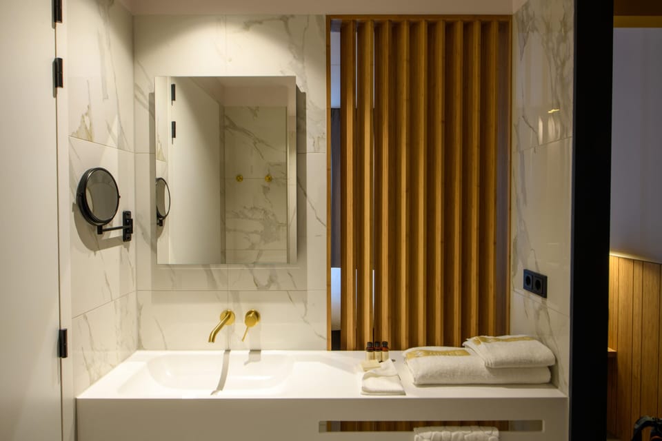 Superior Double Room | Bathroom | Shower, rainfall showerhead, designer toiletries, hair dryer