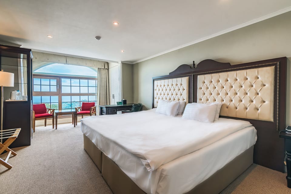 Hollywood Room (Large King Bed) | Premium bedding, down comforters, blackout drapes, soundproofing