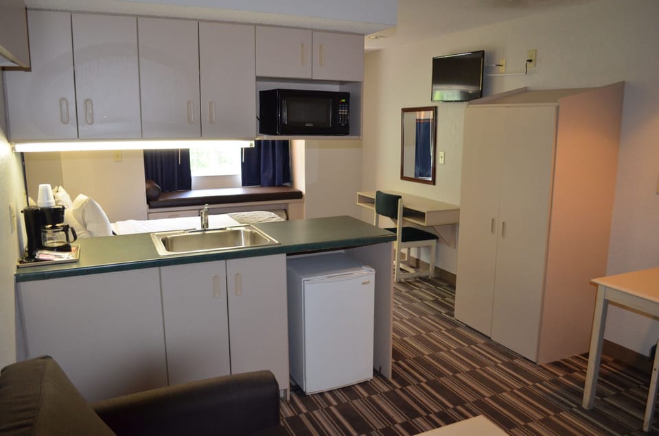 Suite, 1 King Bed, Non Smoking | Private kitchenette | Fridge, microwave