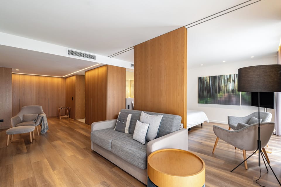 Signature Suite, Balcony | Living area | Flat-screen TV, pay movies