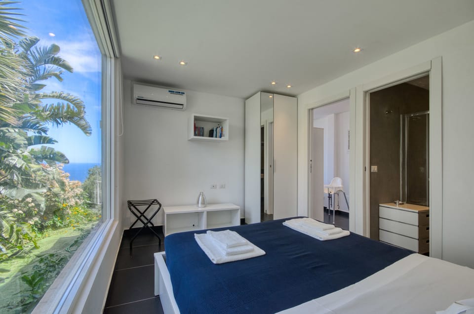 Panoramic Apartment, 1 Bedroom, Sea View, Garden Area with Hydromassage (Private entrance) | In-room safe, blackout drapes, iron/ironing board, travel crib