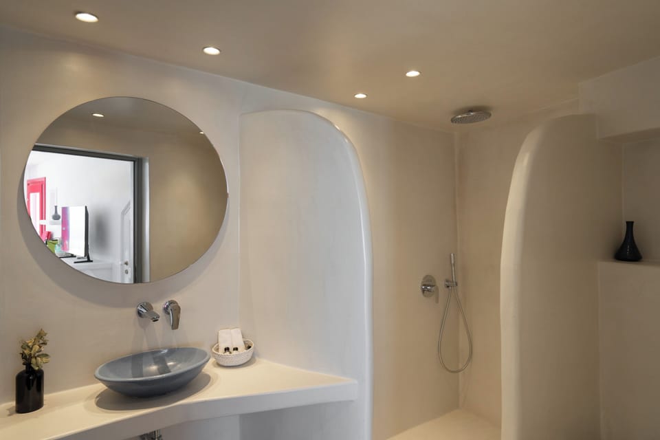 Shower, rainfall showerhead, designer toiletries, hair dryer