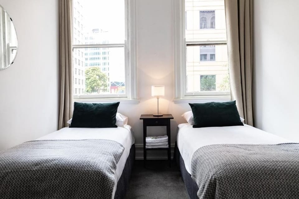 Twin Room, Shared Bathroom | Iron/ironing board, free cribs/infant beds, free WiFi, bed sheets