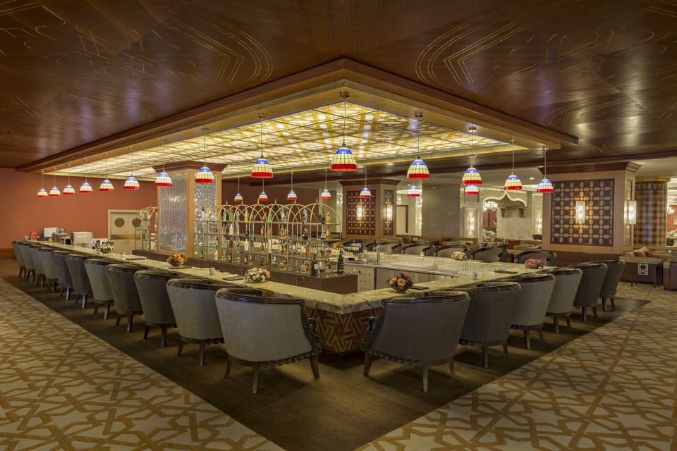 4 bars/lounges, poolside bar, beach bar