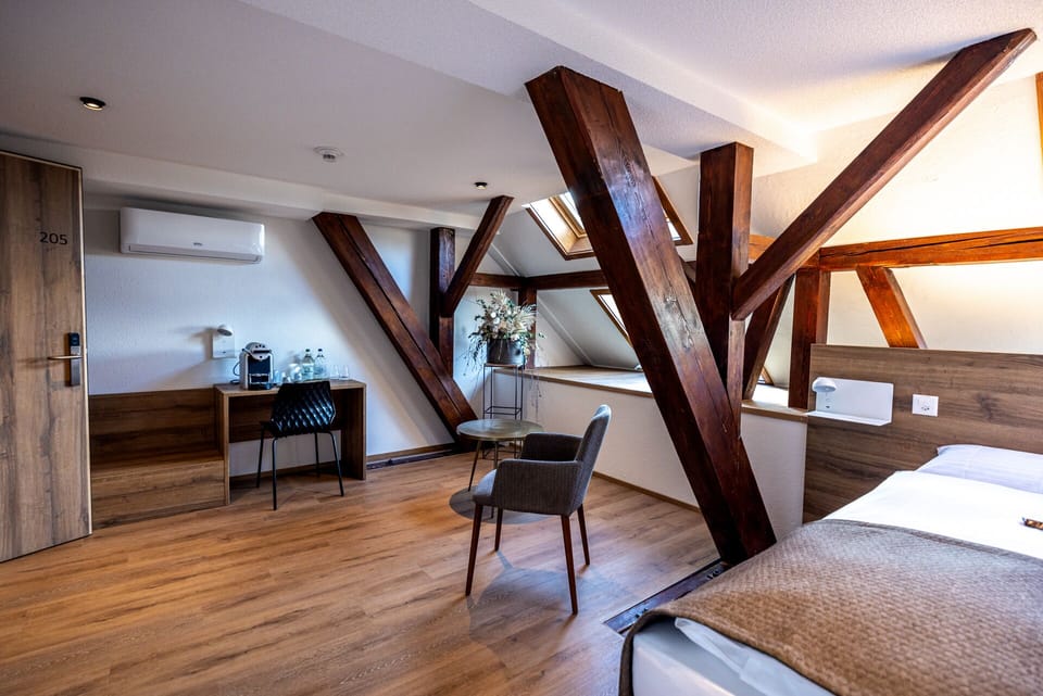 Superior Double Room | Living area | 40-inch LCD TV with cable channels, TV, heated floors