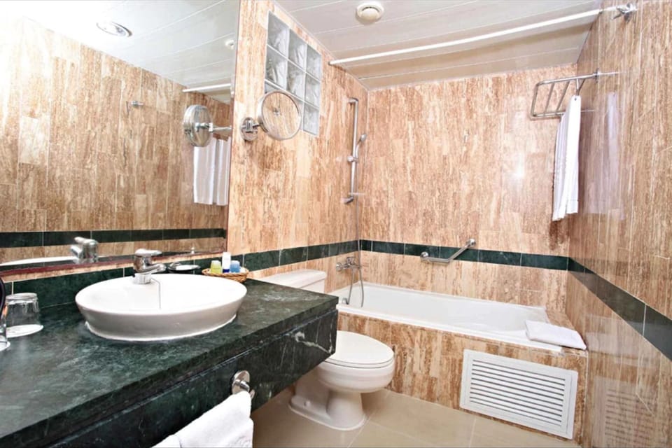 Separate tub and shower, jetted tub, free toiletries, hair dryer