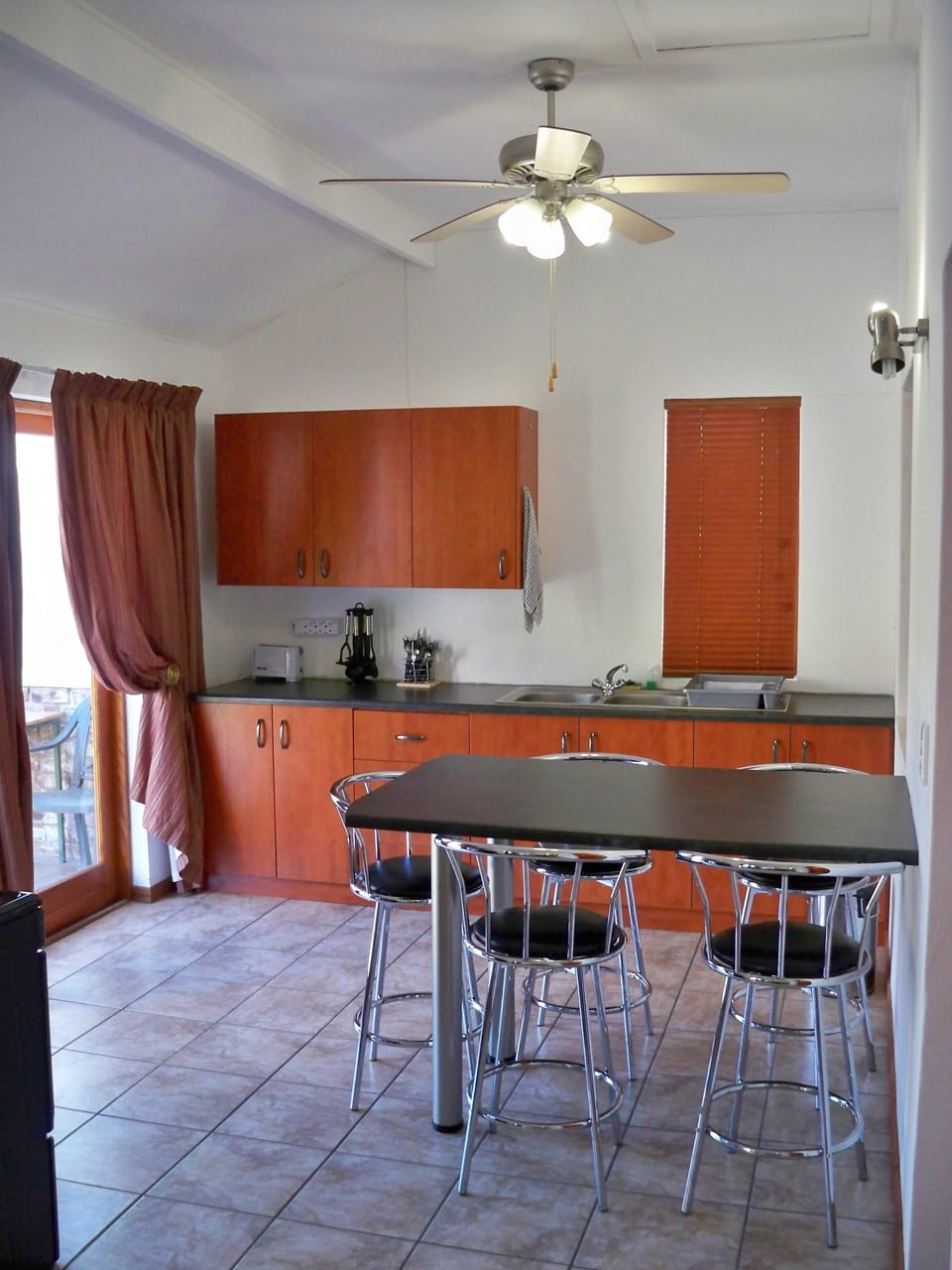 Deluxe Two Bedroom Apartment | Private kitchen | Fridge, microwave, coffee/tea maker, electric kettle