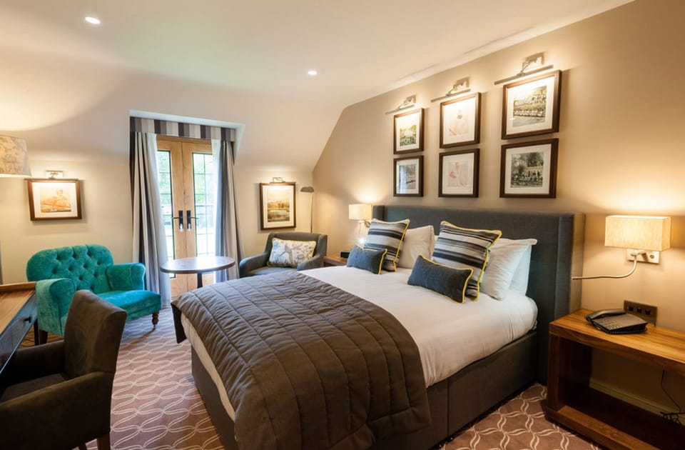 Premium Room, 1 King Bed, River View | In-room safe, desk, iron/ironing board, cribs/infant beds