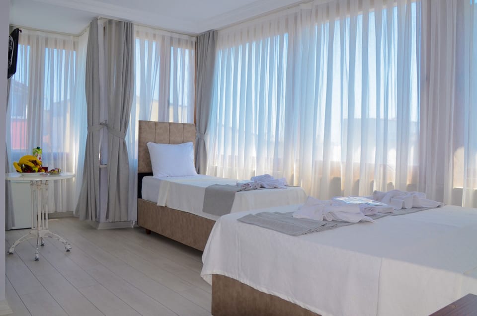 Standard Triple Room, 3 Bedrooms | Egyptian cotton sheets, Select Comfort beds, in-room safe