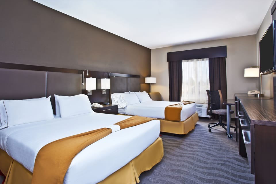 Pillowtop beds, desk, laptop workspace, blackout drapes