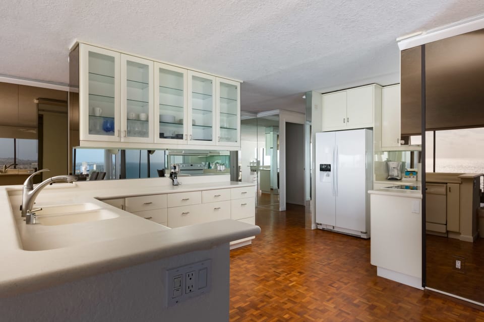 3-Bedroom Condominium - 1201 | Private kitchen | Full-size fridge, microwave, stovetop, dishwasher