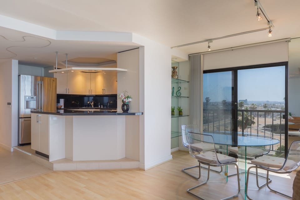 3-Bedroom Condominium - 501 | Private kitchen | Full-size fridge, microwave, stovetop, dishwasher