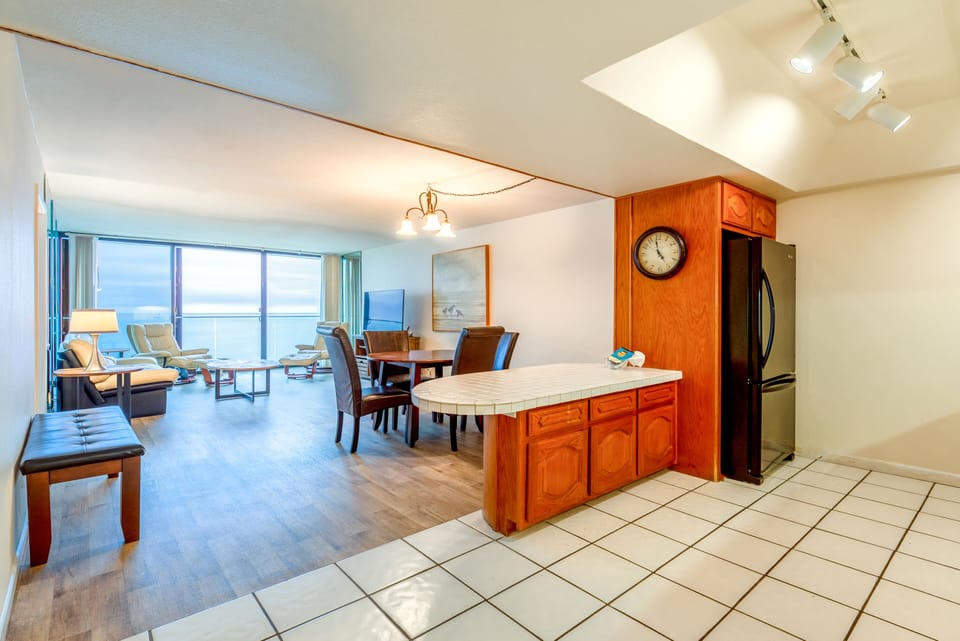 Standard 2-Bedroom Condominium #1110 | Living area | 32-inch flat-screen TV with cable channels, TV, DVD player