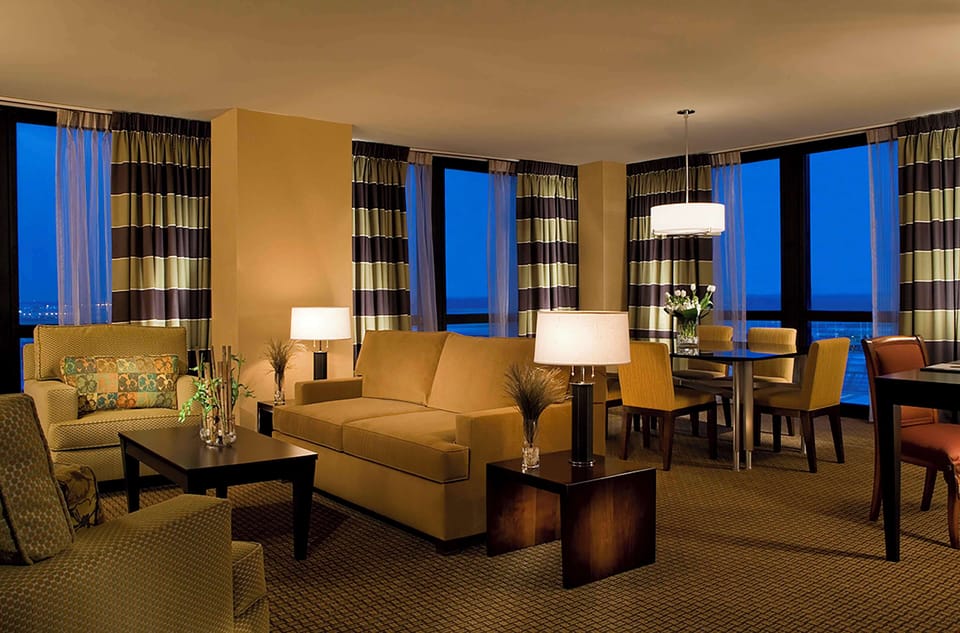 55-inch TV with cable channels, video-game console, pay movies