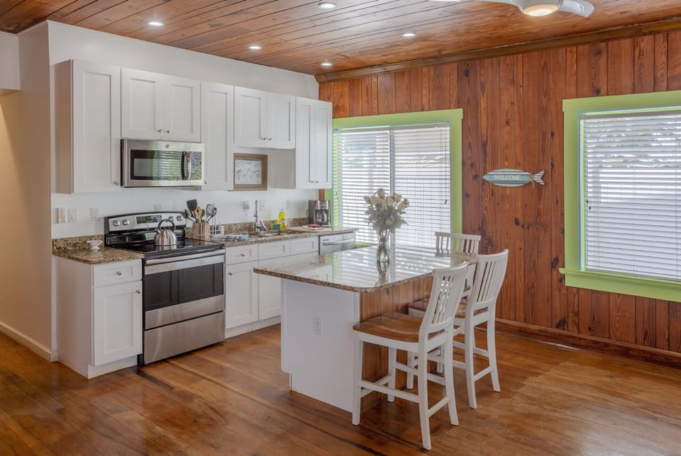 Family Triple Room, 3 Bedrooms, 2 Bathrooms | Private kitchen | Full-size fridge, microwave, oven, stovetop