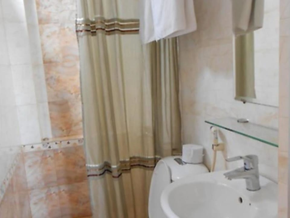 Second Class Double/Twin | Bathroom | Shower, hair dryer, slippers, bidet