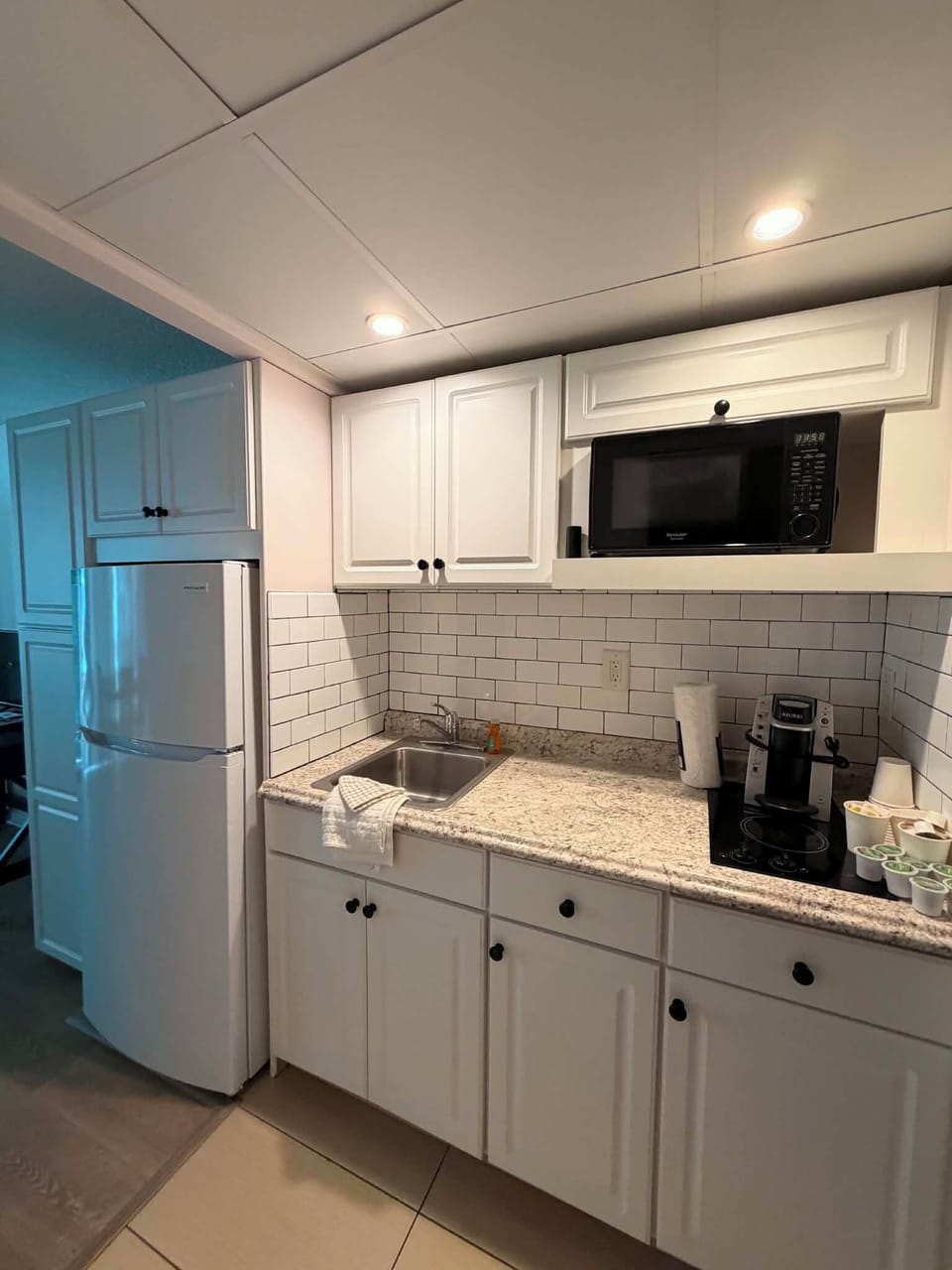 1 Bedroom Suite, Living Room, Kitchen | Private kitchen | Coffee/tea maker, microwave, toaster, cookware/dishes/utensils