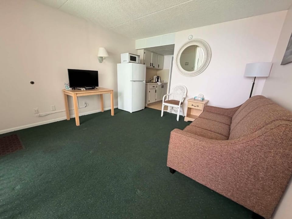 1 Bedroom Suite, Living Room, Kitchen | Living room | Flat-screen TV