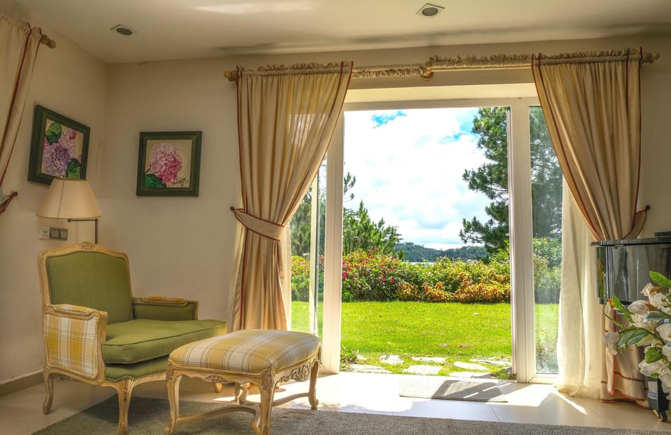 Family Villa, 2 Bedrooms, Lake View | Living area | LCD TV, foosball, table tennis, books