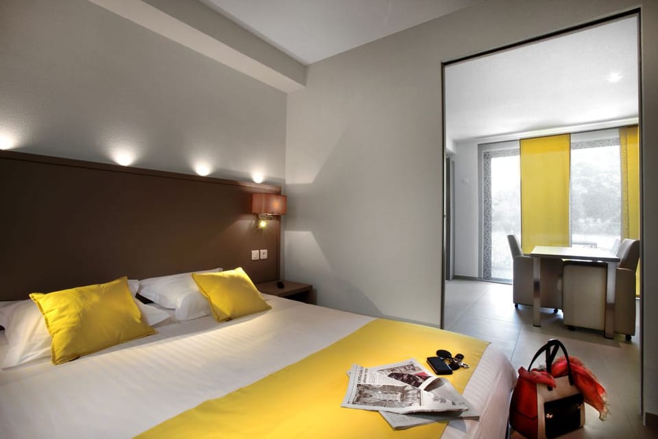 Luxury Apartment, Pool View | Living area | Flat-screen TV