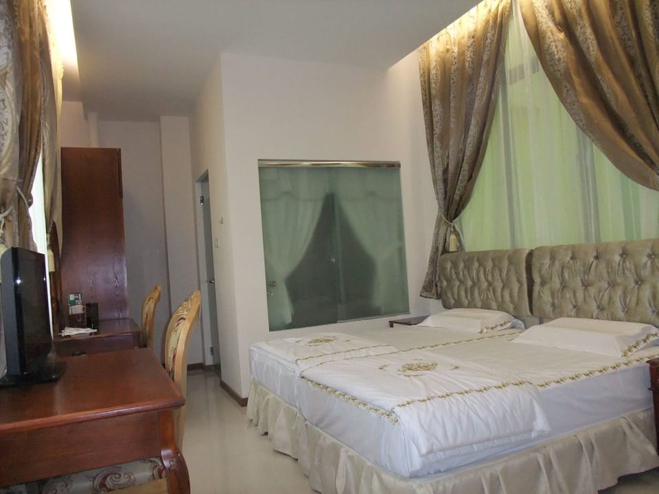 Superior Double Room | Minibar, in-room safe, laptop workspace, iron/ironing board (on request)